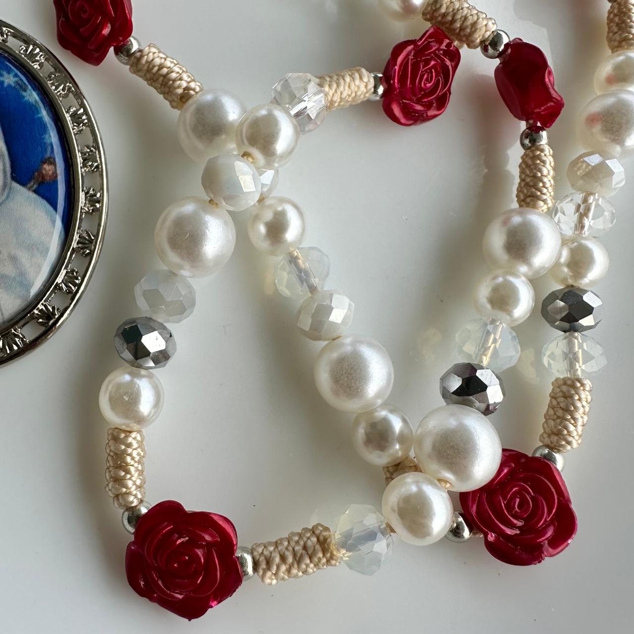 Rosas rojas a María