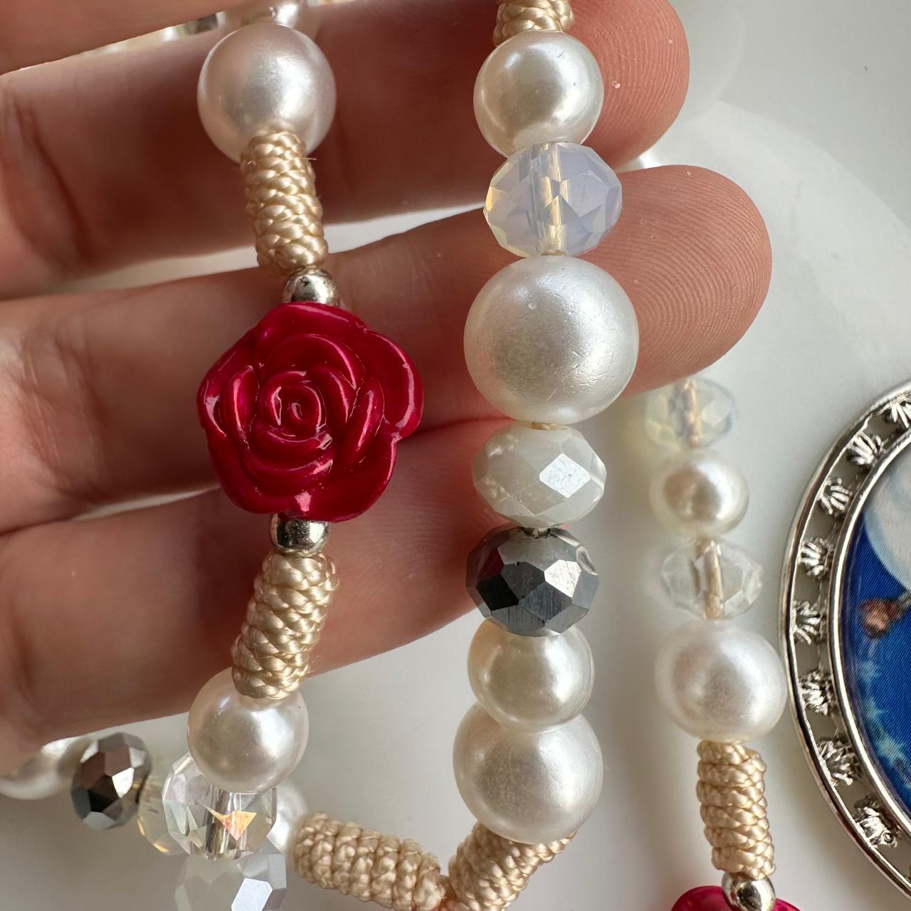 Rosas rojas a María